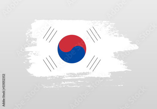 Modern style brush painted splash flag of South Korea with solid background