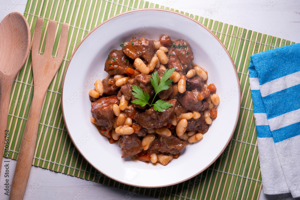 Stewed beef with broad beans and carrot. Traditional northern Spanish tapas. Stewed beef with broad beans and carrot. Traditional northern Spanish tapas.