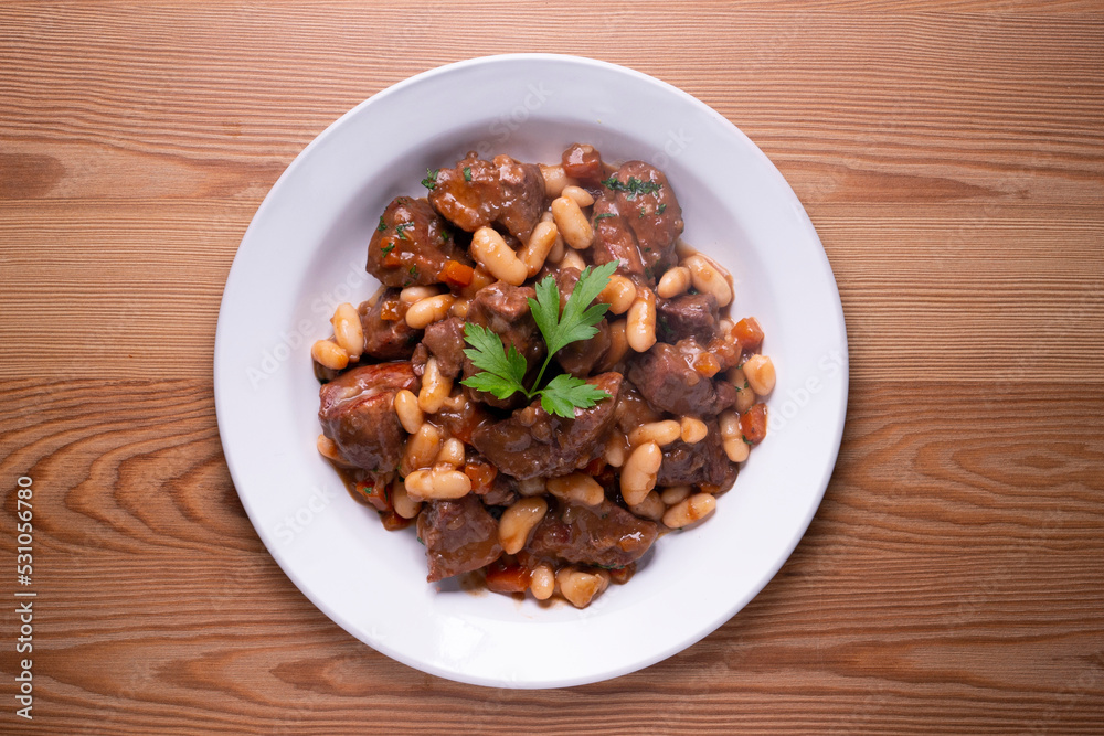 Stewed beef with broad beans and carrot. Traditional northern Spanish tapas. Stewed beef with broad beans and carrot. Traditional northern Spanish tapas.