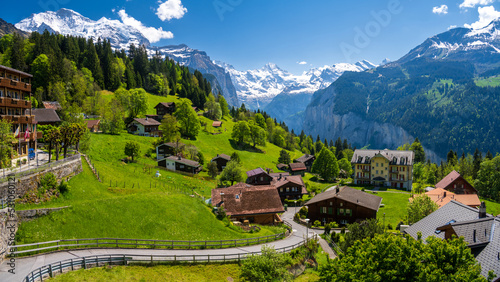 Obraz na płótnie landscape of alpine village Wengen during spring sunny day in Switzerland w salonie