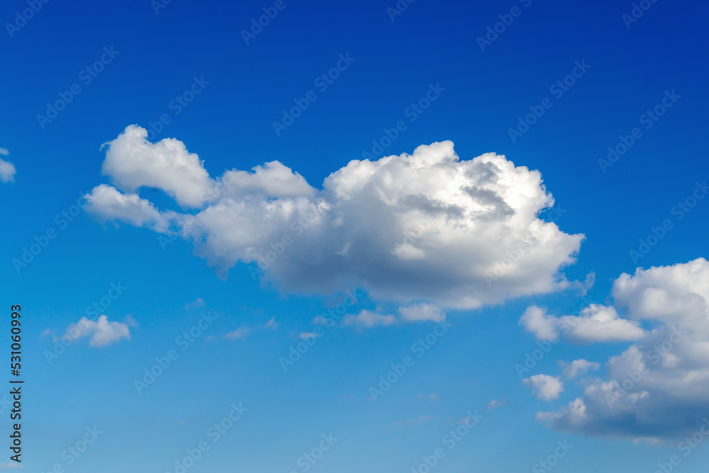 white large cloud against the blue sky white large cloud against the blue sky
