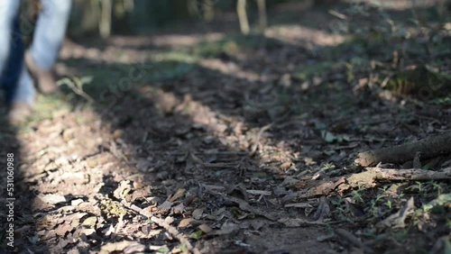 Wallpaper Mural A  man in work boots walks pass the camera Torontodigital.ca