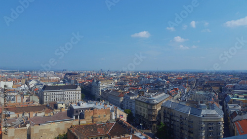 Fototapeta Naklejka Na Ścianę i Meble -  Aerial View Of Cityscape Against Sky with clouds