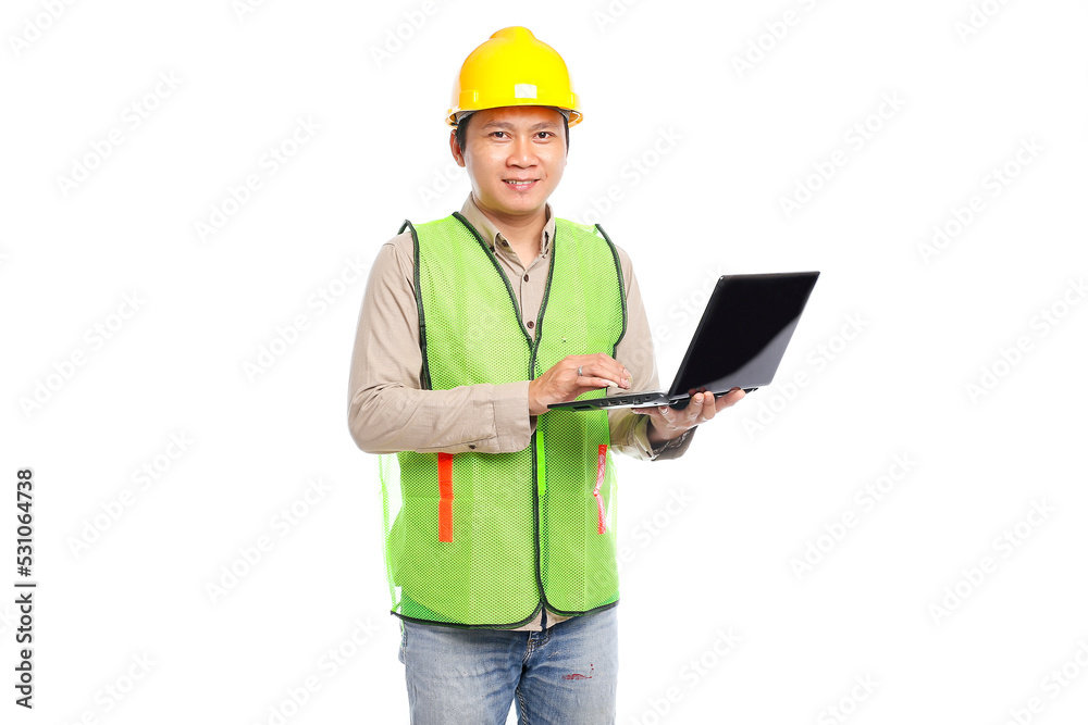 Young asian male construction worker and yellow safety helmet holding laptop on white background