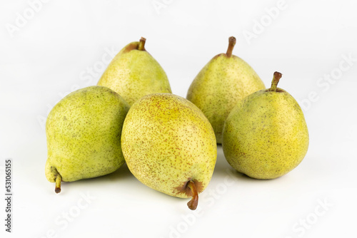 On a white background 5 pears. Fruit background.