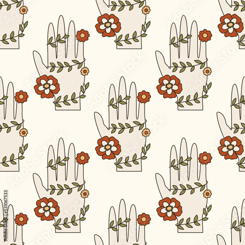 Seamless vector pattern with vintage bohemian hand, flowers and bindweed. 60s and 70s vibes psychedelic background. Cartoon future prediction symbol texture. Boho illustration of providence sign
