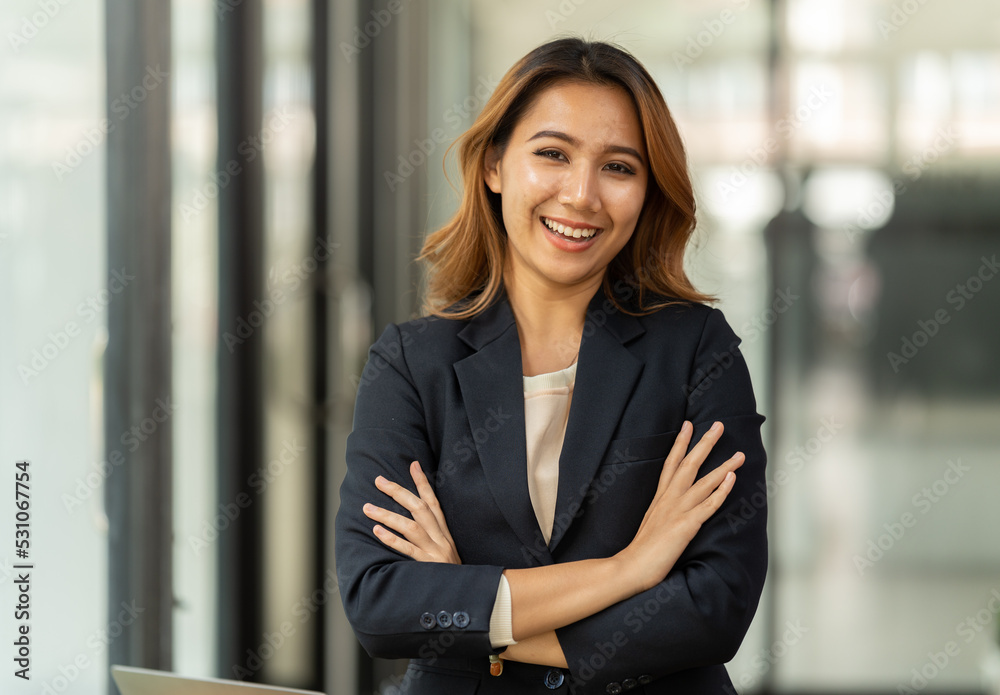 Smiling Pretty Business Asian Woman With Arms Crossed. Smiling Pretty Business Asian Woman With Arms Crossed.