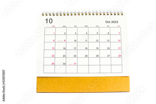 october desk calendar 2023 for planners and reminders on a white background. photo