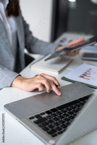 Business woman working on laptop