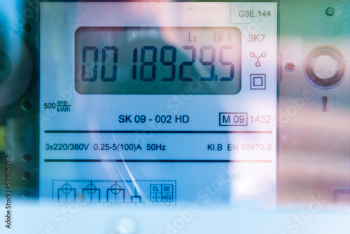 New smart digital electric meter.closeup.Home electricity meter. modern technology that can monitor electricity consumption.reflections on the protective glass.