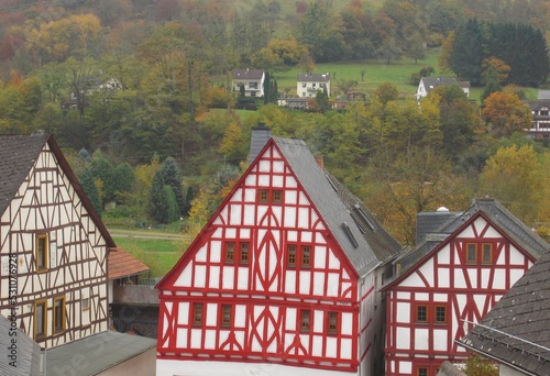 Colorful half-timbered houses in autumn in Dausenau, Germany photo