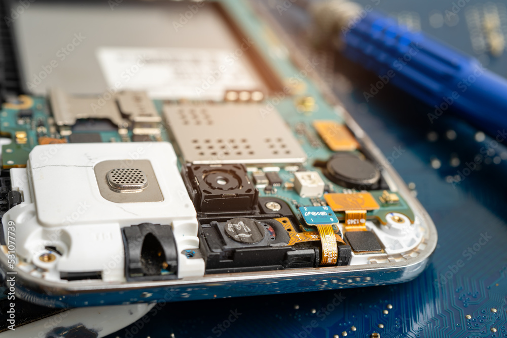 Repairing and upgrade mobile phone, electronic, computer hardware and technology concept. Repairing and upgrade mobile phone, electronic, computer hardware and technology concept.