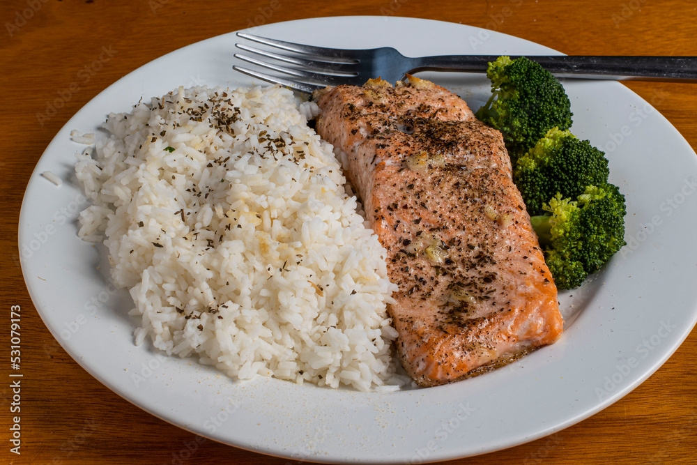 baked season salmon with rice and broccoli baked season salmon with rice and broccoli