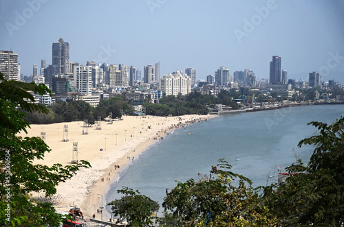 Looking down on Mumbai beachfront with the highrise modern city beyond, from Malabar Hill, Mumbai, India photo