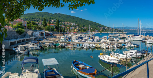 View of boats in the marina and Adriatic Sea at Icici, Icici, Kvarner Bay, Croatia photo