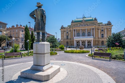 View of Ivan Zajc statue in Theatre Park and Croatian National Theatre, Rijeka, Kvarner Bay, Croatia photo