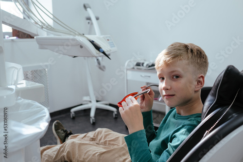Young boy in dentistry on chair