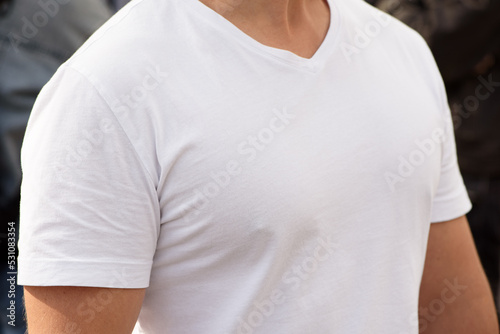 Obraz na płótnie Unrecognizable man dressed white t-shirt. Template for your design. Three-quarter front view. Closeup. w salonie