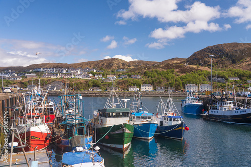 Fishing and pleasure boats moored in Mallaig harbour, Highlands, Scotland photo