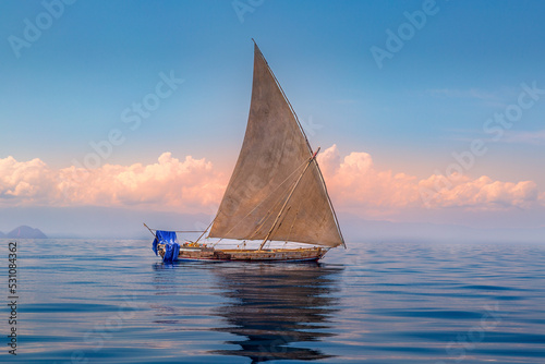 Traditional wooden sailing vessel at sea off the North West coast of Madagascar, Indian Ocean