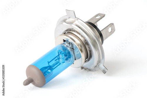 Fotografie Halogen auto lamp, close-up of car headlight bulb isolated on white background
