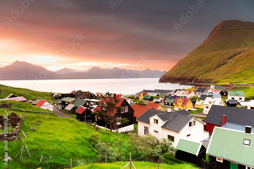 Costal village of Gjogv at sunrise, Eysturoy island, Faroe islands, Denmark photo