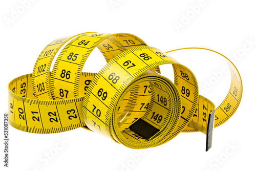 Closeup of an isolated yellow measuring tape photo