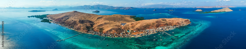 Aerial view of fishing village called Papagarang in Komodo National Part, East Nusa Tenggara, Flores, Indonesia.