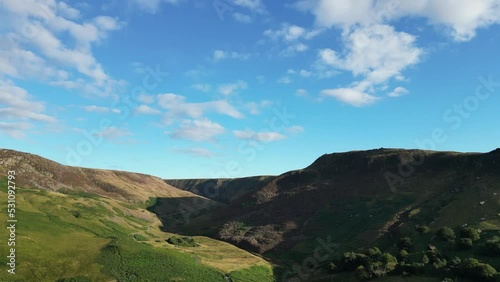 Beautiful summer landscape of Dovestone Reservoir with the cloudy blue sky. Greenfield, England. photo