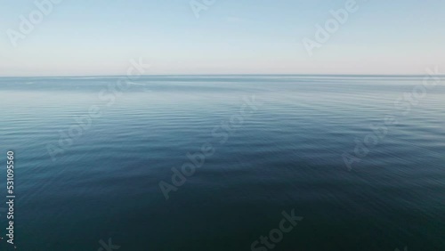 Wallpaper Mural Flight to the calm surface of the sea in the morning. Torontodigital.ca