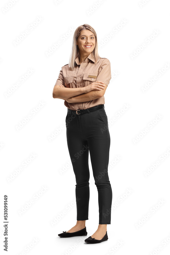 Full length portrait of a female security guard posing with crossed arms Full length portrait of a female security guard posing with crossed arms