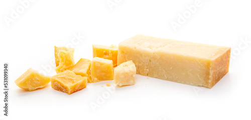 Piece of parmesan cheese on white