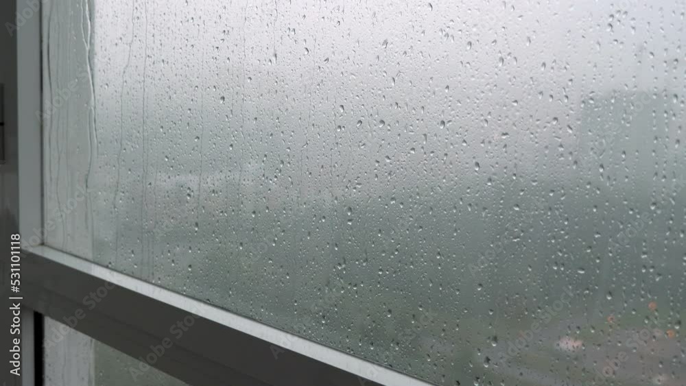 Rain drops on window. Rainy weather. Closeup