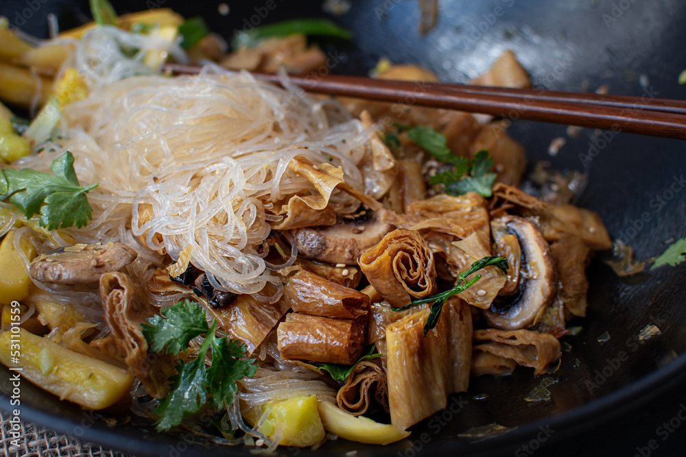 Tofu skins yuba stir fry and noodles in wok Stock Photo Adobe Stock