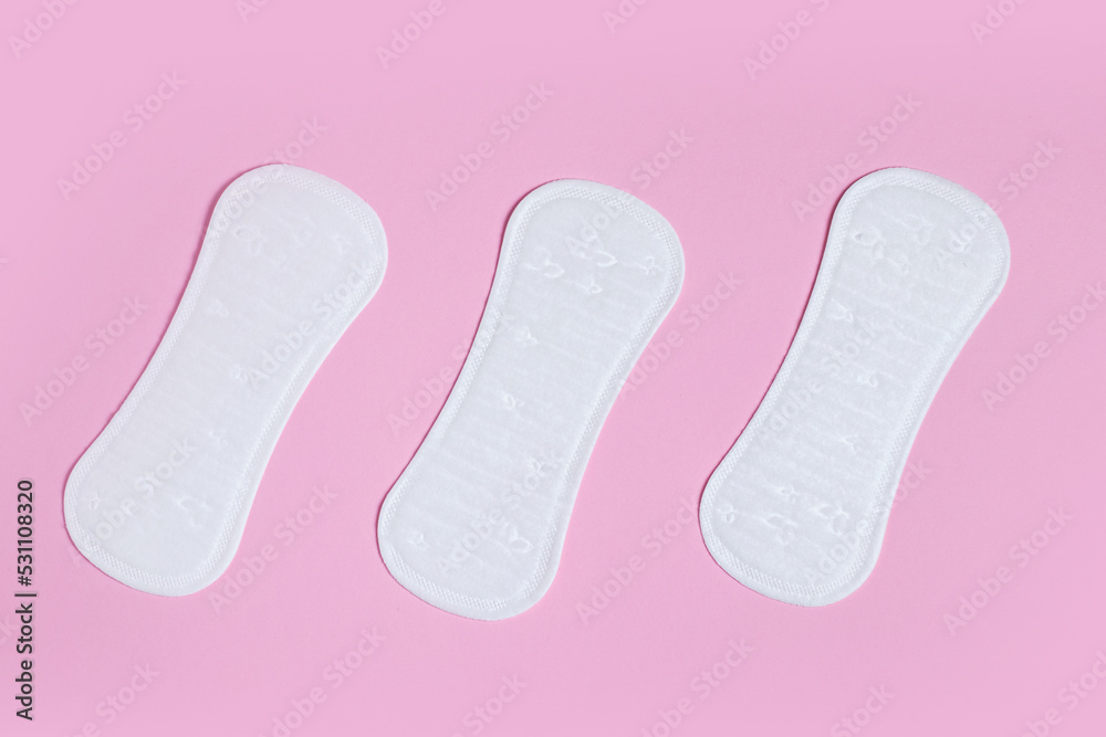 Daily women's gasket on pink background. Woman hygiene protection Daily women's gasket on pink background. Woman hygiene protection