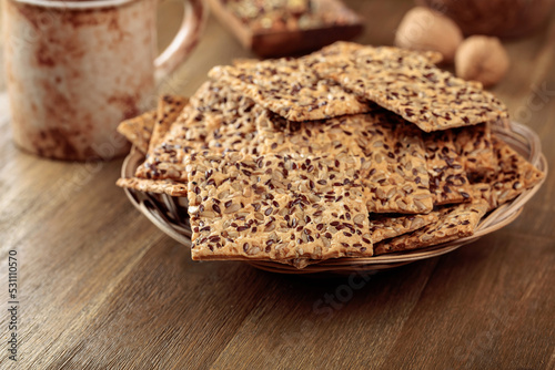 Fotótapéta Crispy crackers with sunflower seeds and flax seeds.