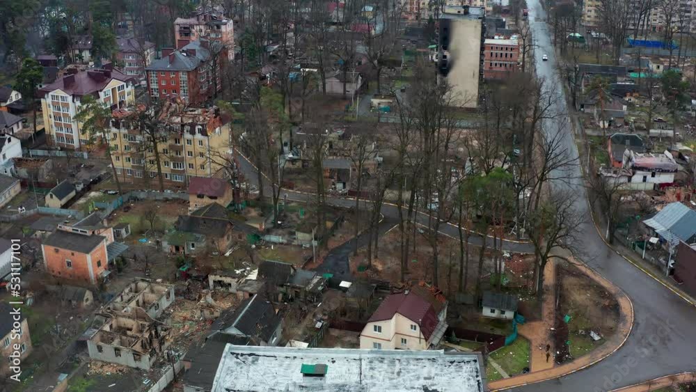 Aerial view of the destroyed and burnt houses. Houses were destroyed by rockets or mines from Russian soldiers. Aerial view of the destroyed and burnt houses. Houses were destroyed by rockets or mines from Russian soldiers.