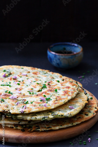 Obraz na płótnie Homemade appetizing scallion pancakes served with soy sauce. w salonie
