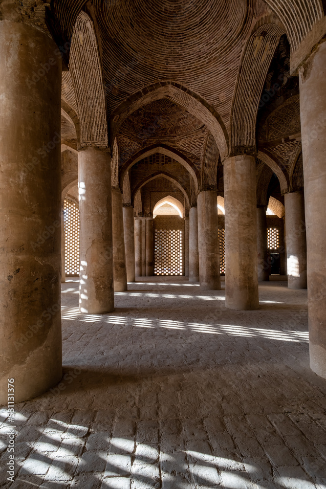 Lights and shadows inside a beautiful mosque in the city of Isfahan in Iran