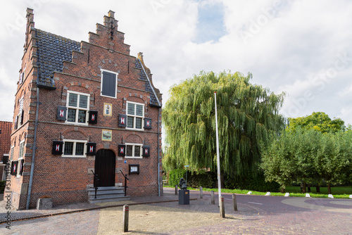 Former town hall from 1639 in the Dutch village of Grootschermer in the  Netherlands. photo