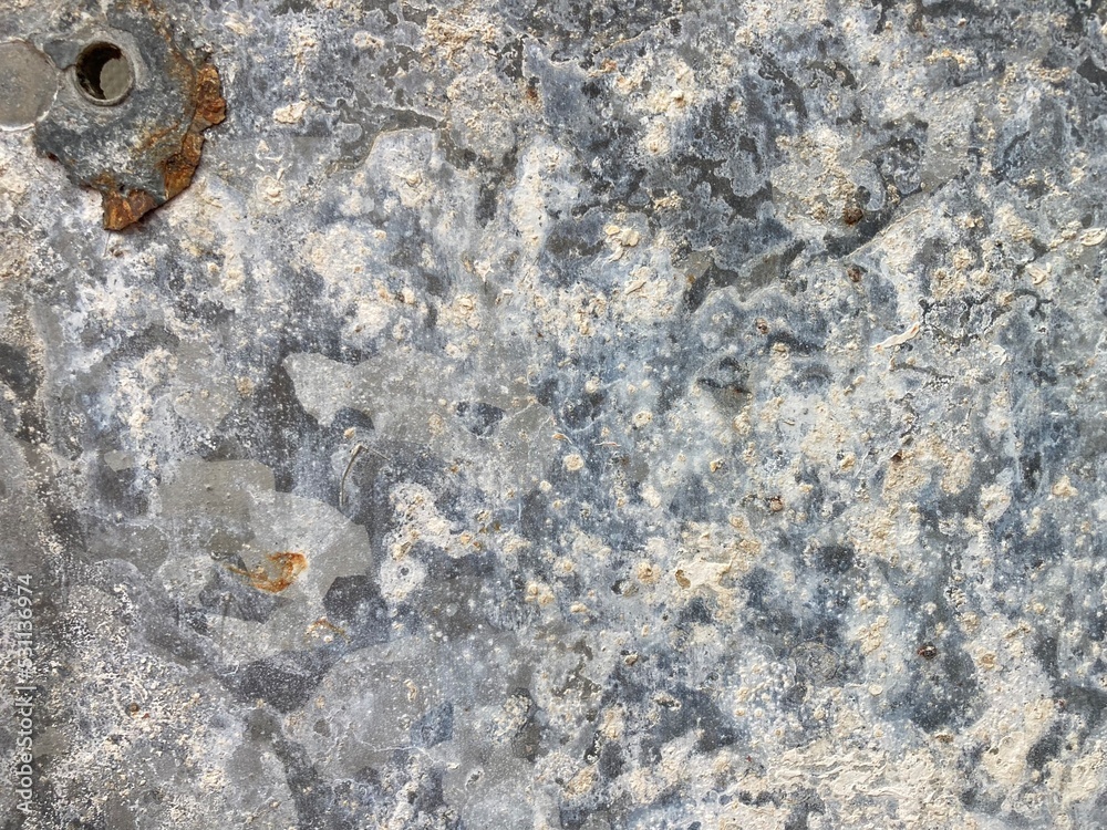 A corroded galvanized metal plate A corroded galvanized metal plate
