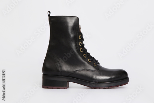 Blank black women's classic Combat boot, spring autumn shoe isolated on white background. Female leather fashion luxury casual footwear. Single. Template, mock up