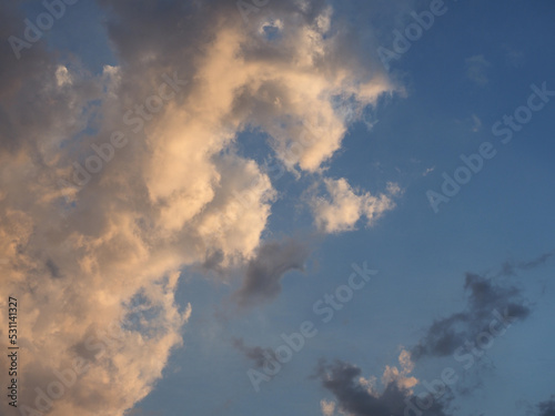 dramatic blue sky at sunset with clouds background