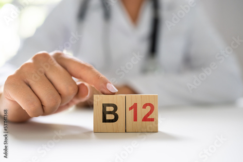 Vitamin B12. Medical Doctor Hand photo