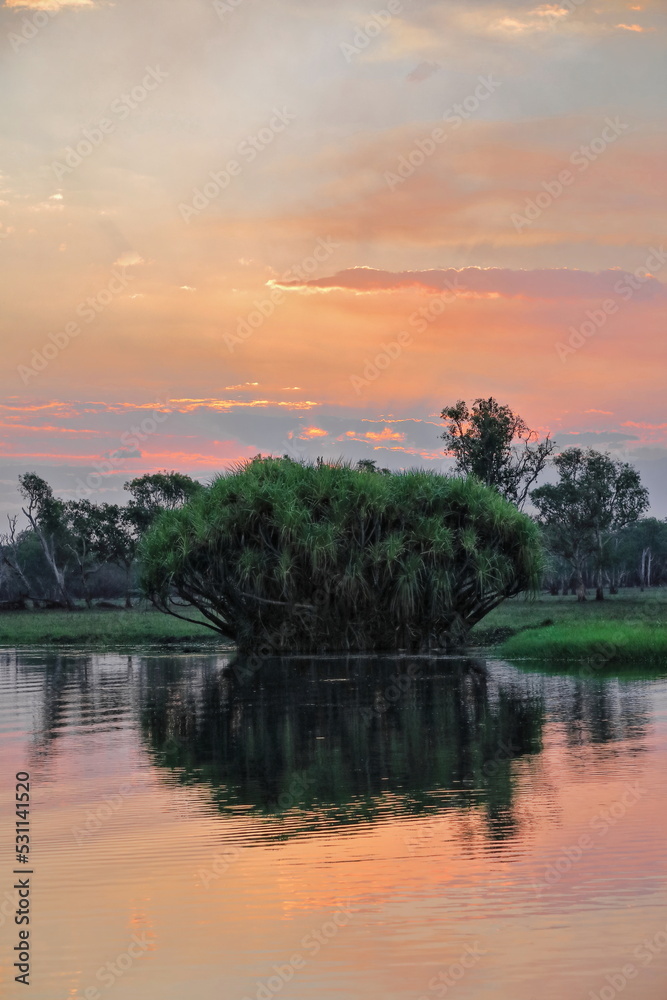 Red sundown over Yellow Water-Nugurrungurrudjba Billabong with pandanus tree. Kakadu-Australia-171