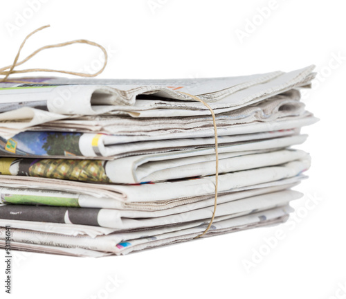 Pile of generic newspapers isolated cut out