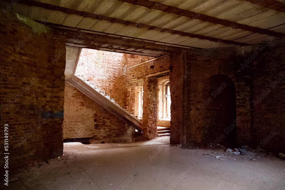 Abandoned old red brick building inside