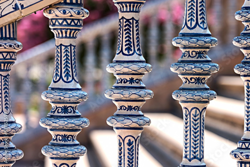 Ceramic blue and white columns with blurred background in Spain square in Sevile, Spain photo