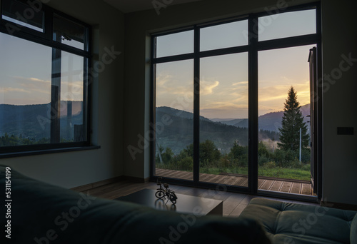 Stunning view of mountain at sunset from living room windows