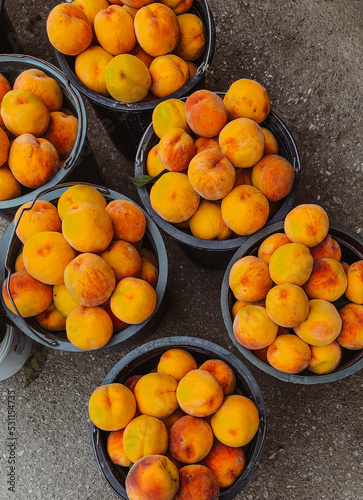 peaches in buckets